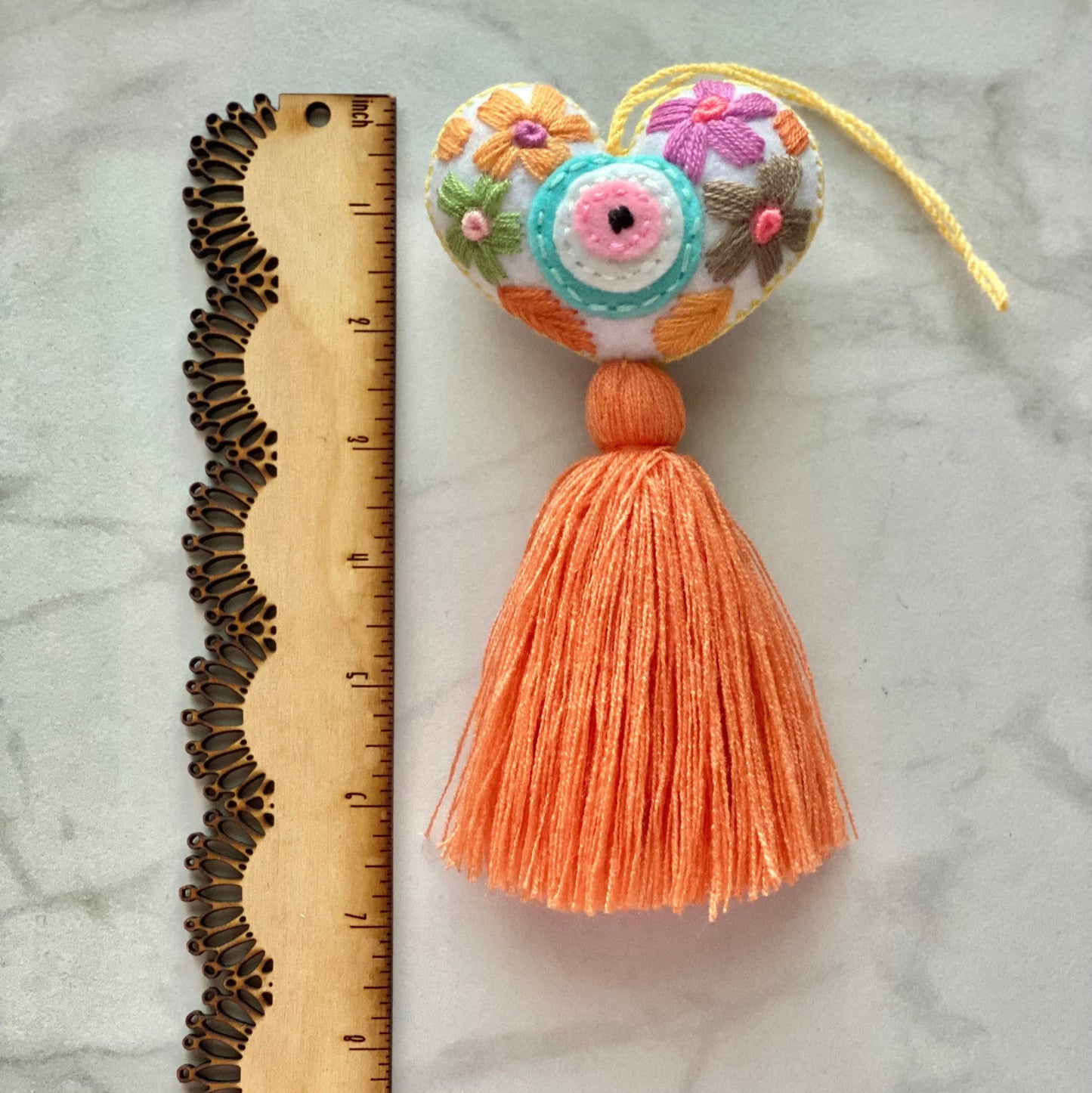 SURPRISE Evil Eye Heart Tassel