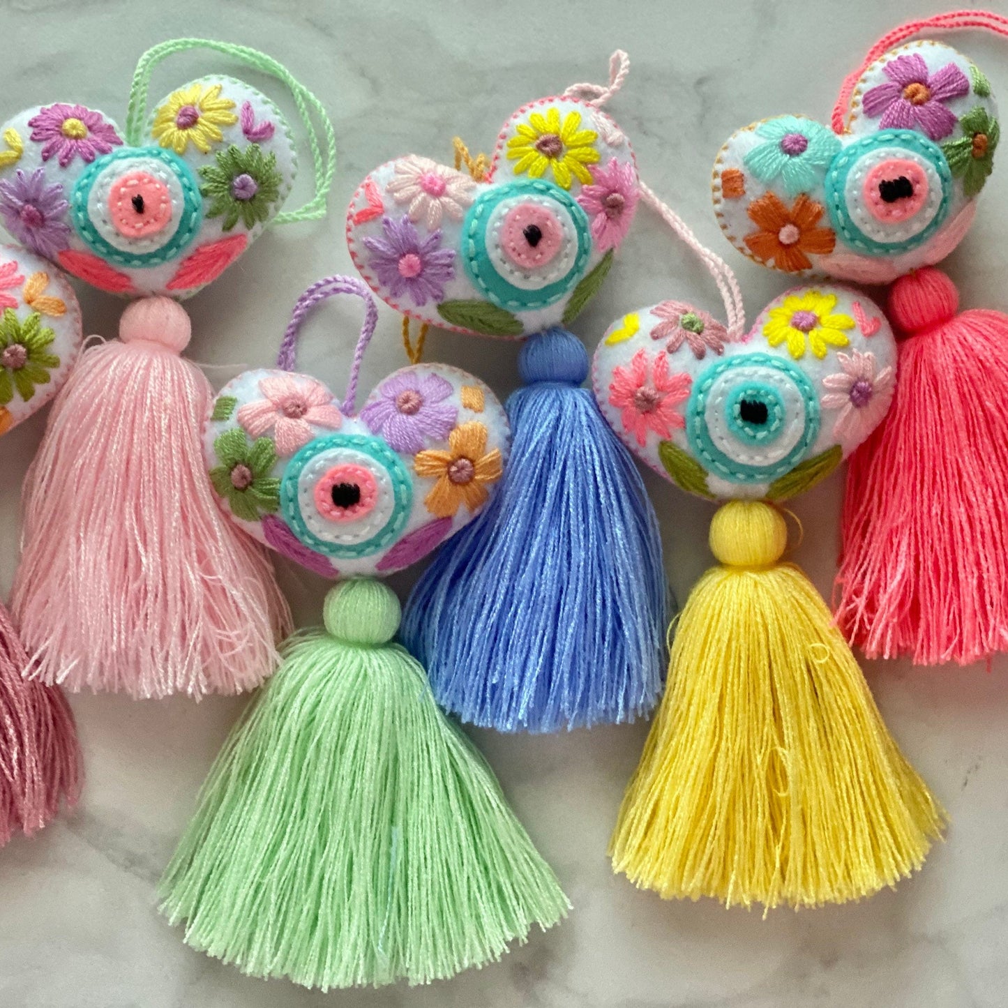 SURPRISE Evil Eye Heart Tassel