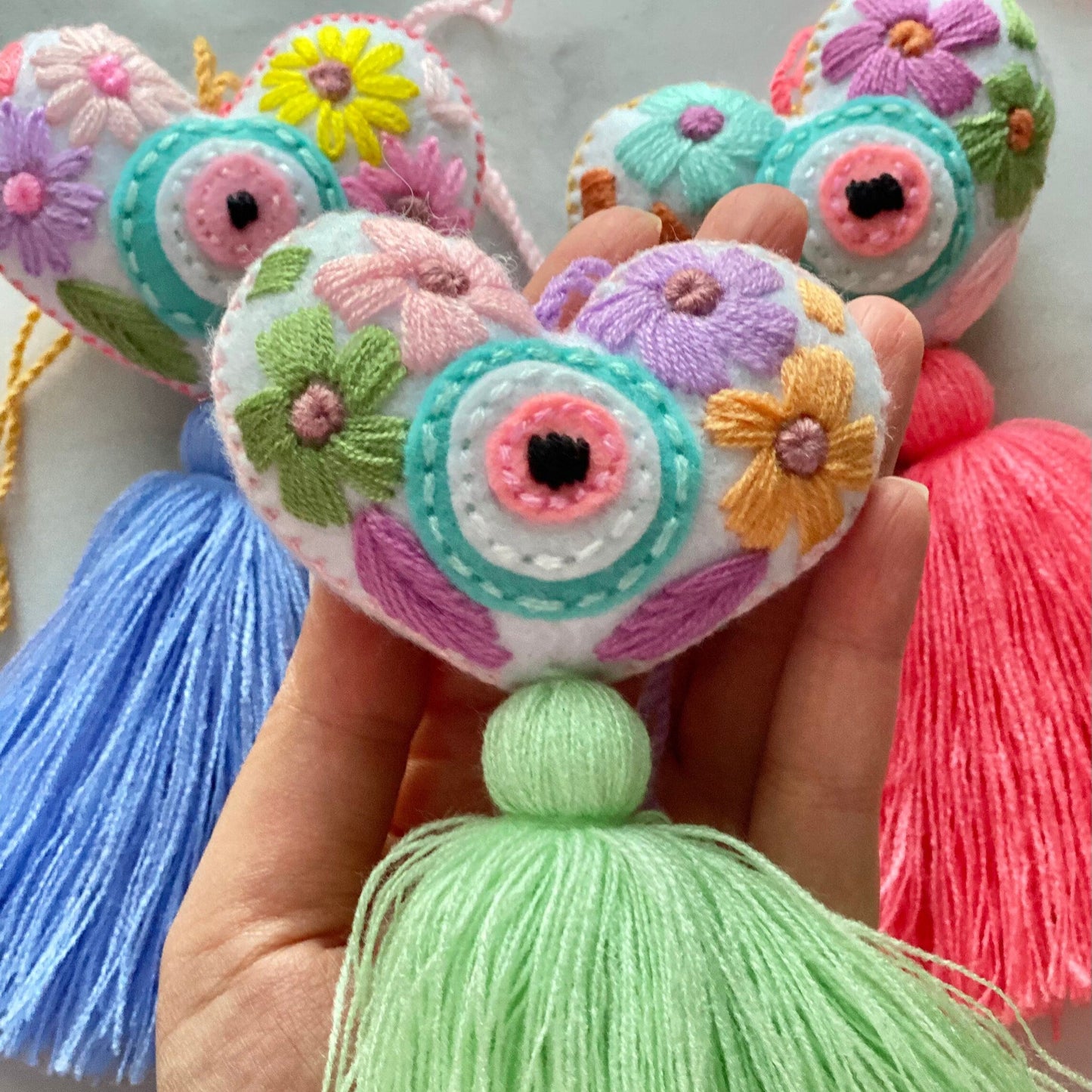 SURPRISE Evil Eye Heart Tassel